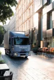 Renault Trucks E-Tech D 12 t / D 14 t in a narrow street in the city centre