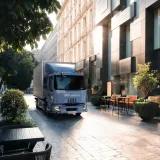 Renault Trucks E-Tech D 12 t / D 14 t in a narrow street in the city centre