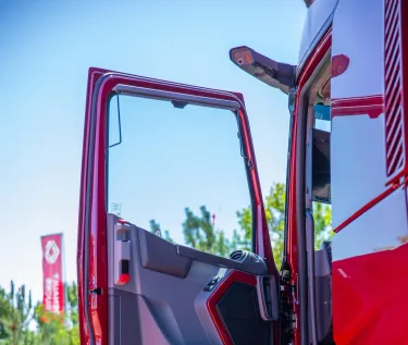 A T High painted by C11 (01 Customised by Renault Trucks) in front of the Bourg-en-Bresse factory.AC